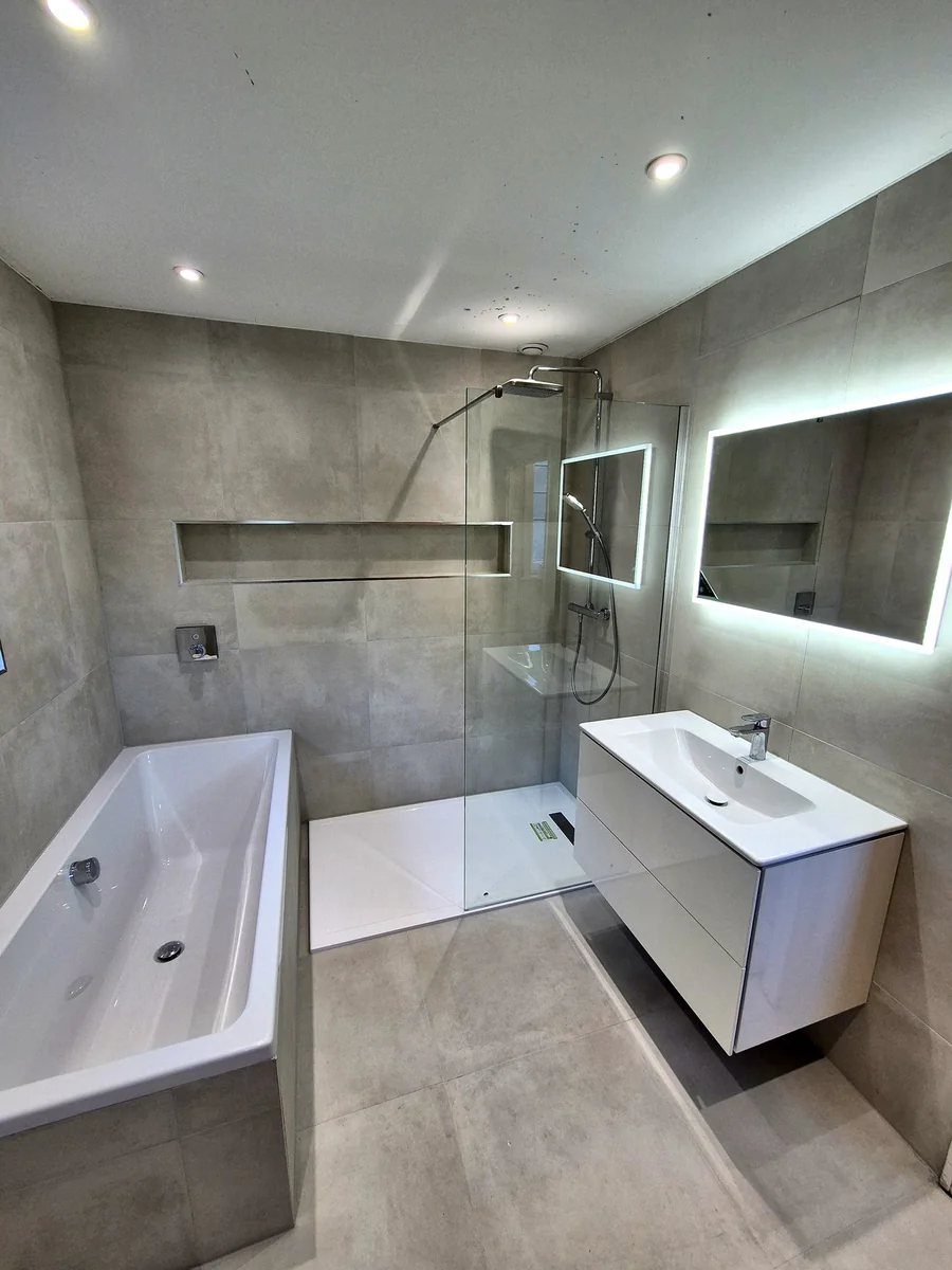 Full en-suite with bath, walk-in shower and LED mirror